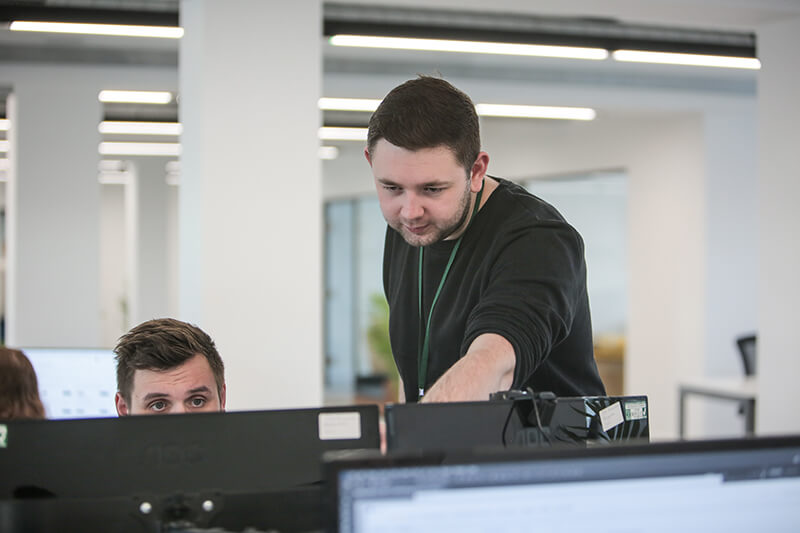 Two Castle colleagues collaborating on a campaign
